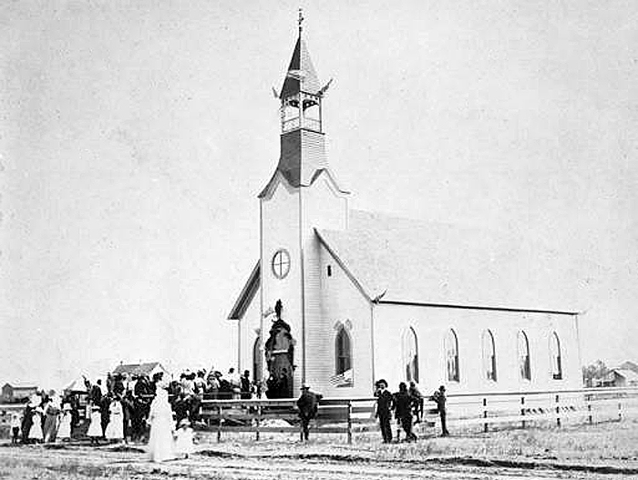Original 1901 photograph of the newly-dedicated church with congregation gathered out front.