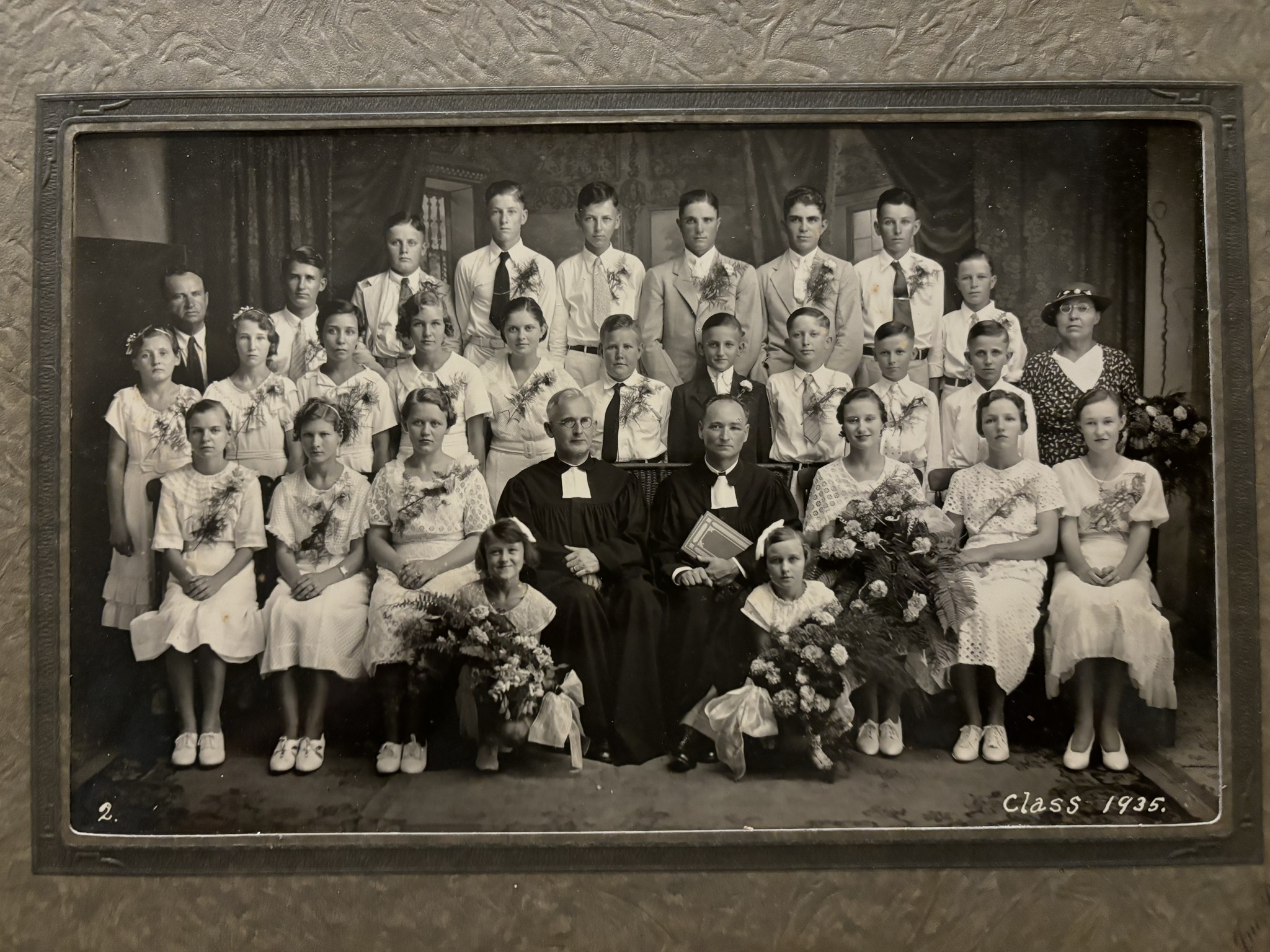 Sepia-tone confirmation portrait labeled Class 1935.