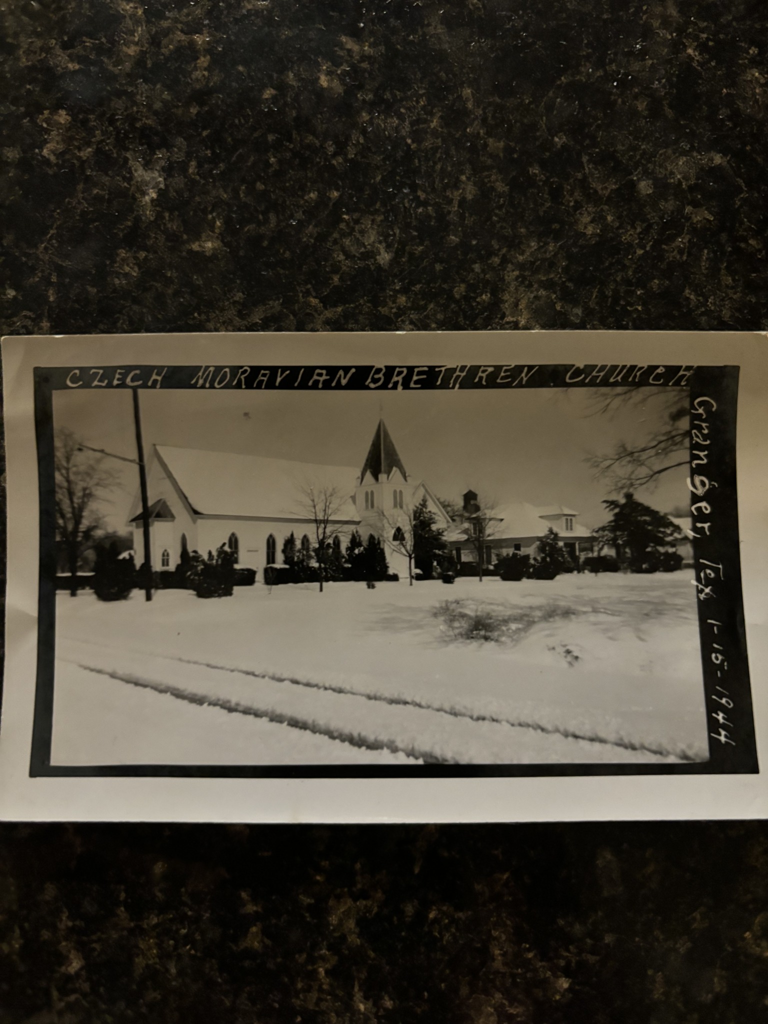 Hand-labeled photograph reading 'Czech Moravian Brethren Church, Granger Tex, 1-15-1944', the church in snow.